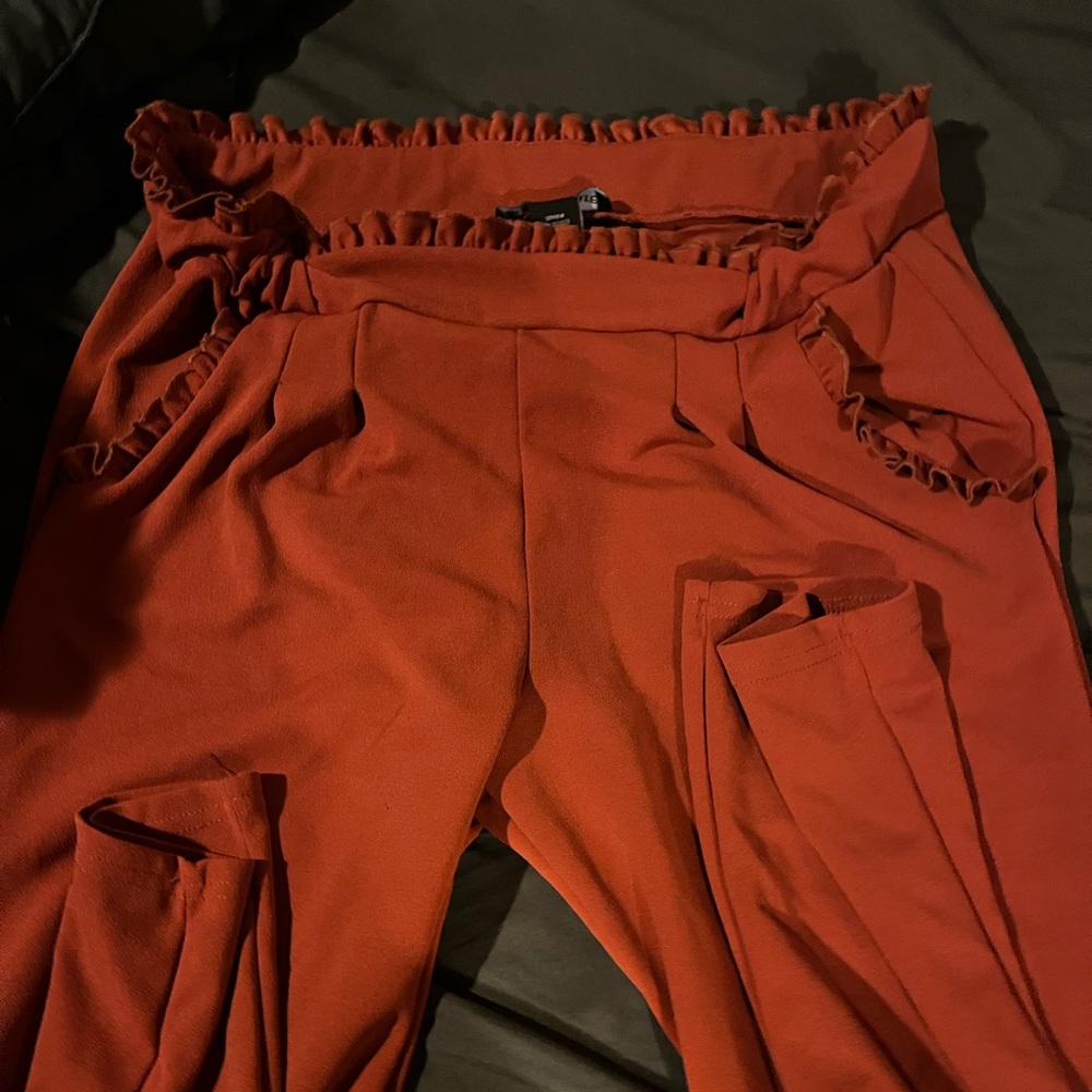 Soho apparel pants. Rust color